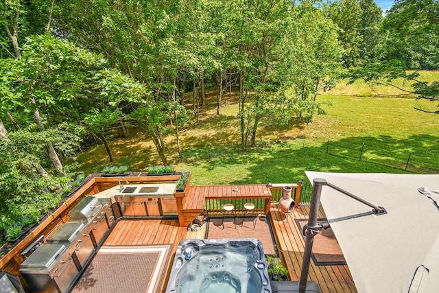 145 W Hollis Chapel Rd, Portland, TN 37148 - wooden terrace with a hot tub, a lawn, and grilling area