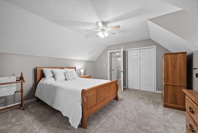 2430 Underwood Rd, Cunningham, TN 37052 - bedroom featuring light carpet, lofted ceiling, a textured ceiling, a ceiling fan, and a closet