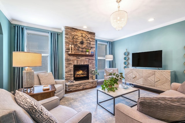 625 Foster Ln, Mount Juliet, TN 37122 - living area with a stone fireplace, ornamental molding, a chandelier, and recessed lighting