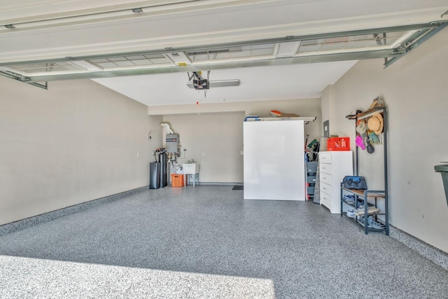 625 Foster Ln, Mount Juliet, TN 37122 - garage featuring a garage door opener and a sink
