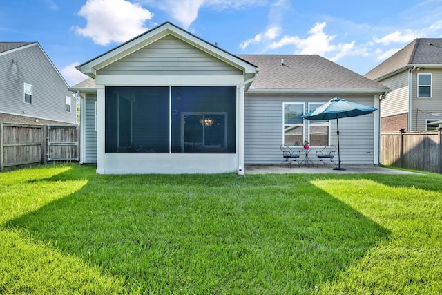 625 Foster Ln, Mount Juliet, TN 37122 - rear view of house featuring a sunroom, a patio area, and a fenced backyard