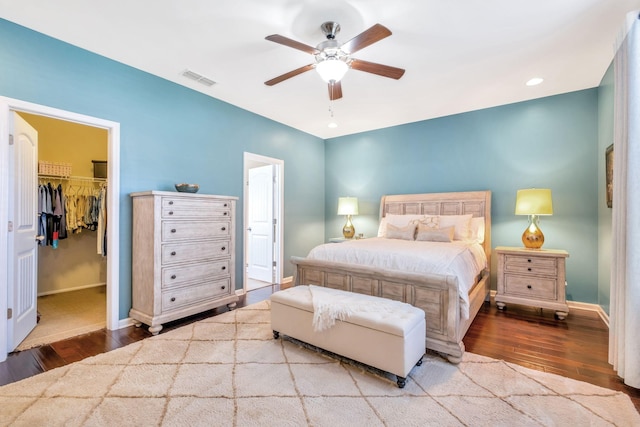 625 Foster Ln, Mount Juliet, TN 37122 - bedroom featuring hardwood / wood-style flooring, a walk in closet, a ceiling fan, a closet, and recessed lighting