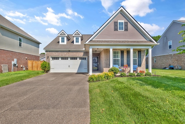 625 Foster Ln, Mount Juliet, TN 37122 - view of front of home featuring covered porch, brick siding, driveway, and a shingled roof