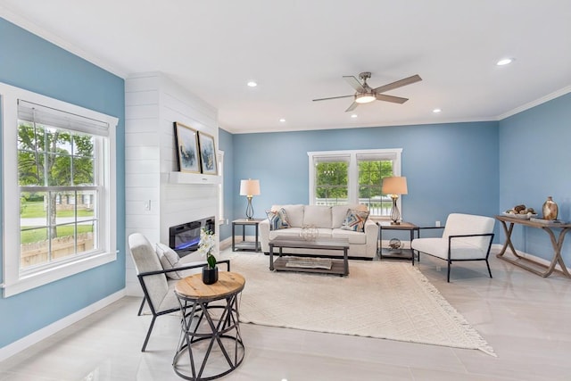 148 Quita Cir, Lebanon, TN 37087 - living area featuring ornamental molding, ceiling fan, healthy amount of natural light, a fireplace, and recessed lighting