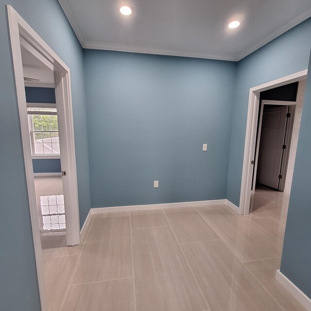 148 Quita Cir, Lebanon, TN 37087 - unfurnished room featuring tile patterned floors, recessed lighting, and crown molding