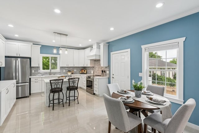 148 Quita Cir, Lebanon, TN 37087 - dining area with ornamental molding and recessed lighting