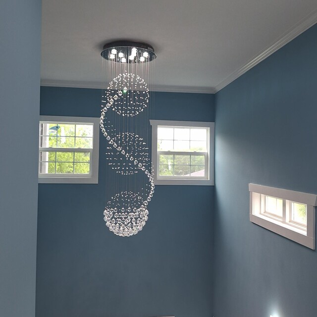 148 Quita Cir, Lebanon, TN 37087 - detailed view of a chandelier and ornamental molding