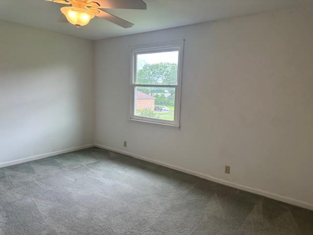 303 Revere Ln, Franklin, TN 37064 - carpeted empty room with baseboards and a ceiling fan
