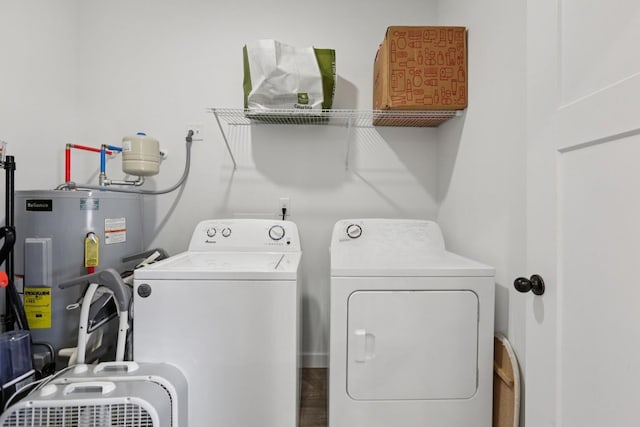 1202 Oak Grove Rd, Dickson, TN 37055 - laundry area with washing machine and clothes dryer and water heater