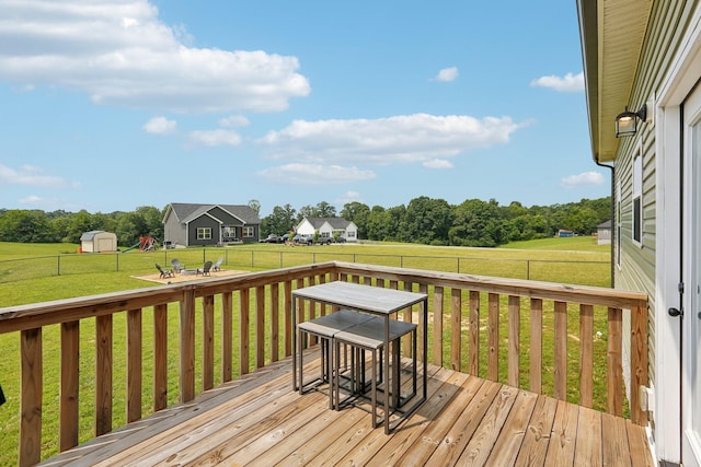 1202 Oak Grove Rd, Dickson, TN 37055 - deck with a storage unit and a fenced backyard
