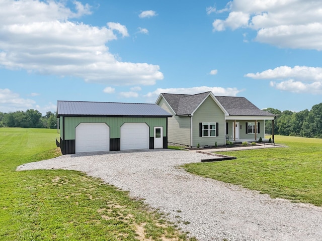 1202 Oak Grove Rd, Dickson, TN 37055 - single story home with an outdoor structure, a front yard, and covered porch