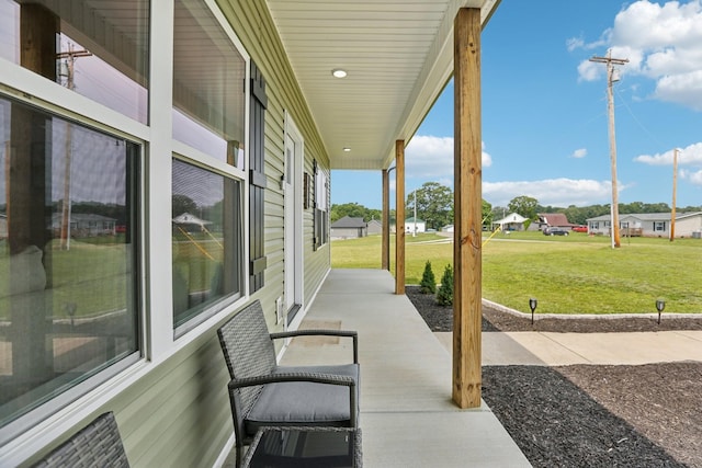 1202 Oak Grove Rd, Dickson, TN 37055 - covered porch with a yard and a residential view
