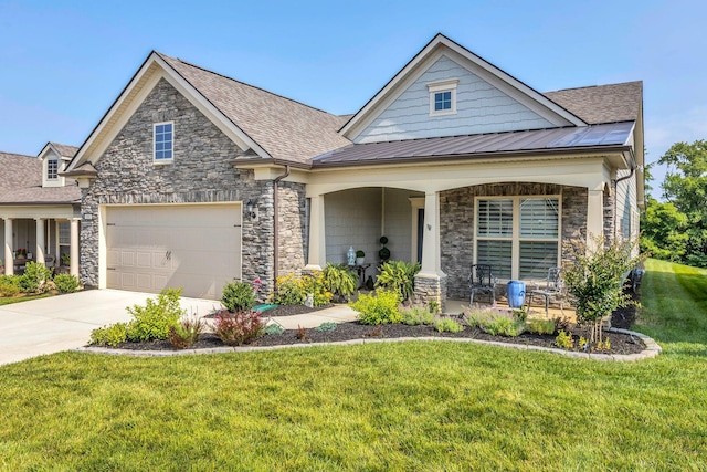 3002 Obion Pass, Spring Hill, TN 37174 - view of front of property with stone siding, covered porch, a front yard, and concrete driveway
