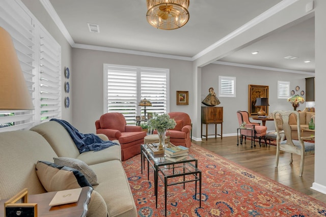 3002 Obion Pass, Spring Hill, TN 37174 - living area with wood finished floors, plenty of natural light, crown molding, a chandelier, and recessed lighting