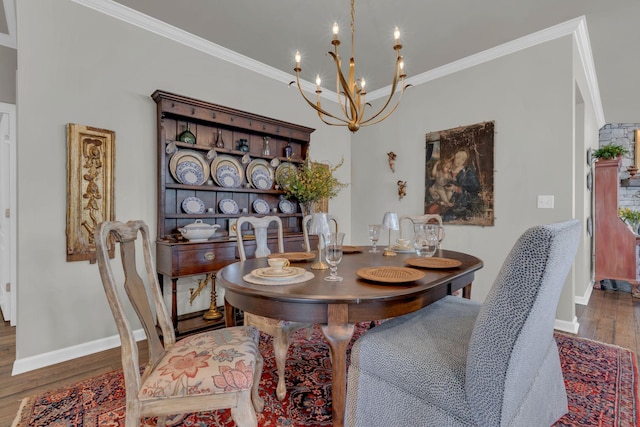 3002 Obion Pass, Spring Hill, TN 37174 - dining space featuring a chandelier, ornamental molding, and wood finished floors