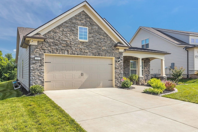 3002 Obion Pass, Spring Hill, TN 37174 - craftsman-style house featuring stone siding, a front lawn, driveway, covered porch, and a garage