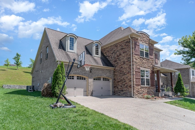 76 Molly Bright Ln, Franklin, TN 37064 - view of side of home featuring driveway, a lawn, a garage, and brick siding