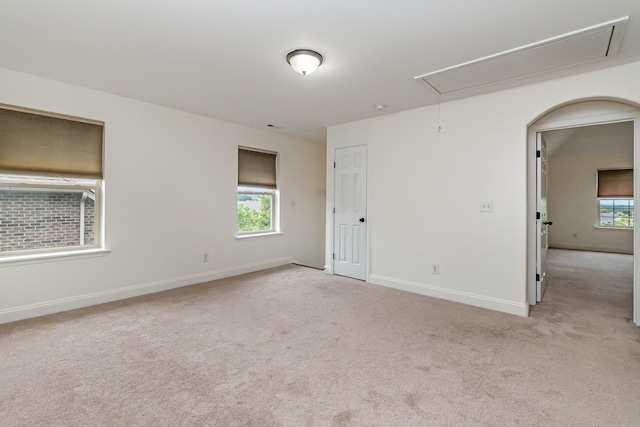 76 Molly Bright Ln, Franklin, TN 37064 - unfurnished room featuring attic access and light colored carpet