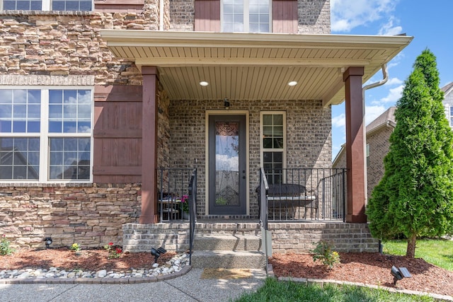 76 Molly Bright Ln, Franklin, TN 37064 - doorway to property with a porch and stone siding