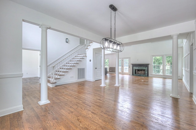 1202 Willow Brook Pass, Mount Juliet, TN 37122 - unfurnished living room featuring stairway, wood finished floors, and a fireplace