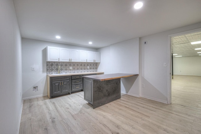 1202 Willow Brook Pass, Mount Juliet, TN 37122 - bar area with light wood-style floors, decorative backsplash, and recessed lighting