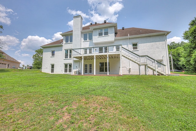 1202 Willow Brook Pass, Mount Juliet, TN 37122 - rear view of property featuring a chimney, stairway, french doors, a lawn, and a deck