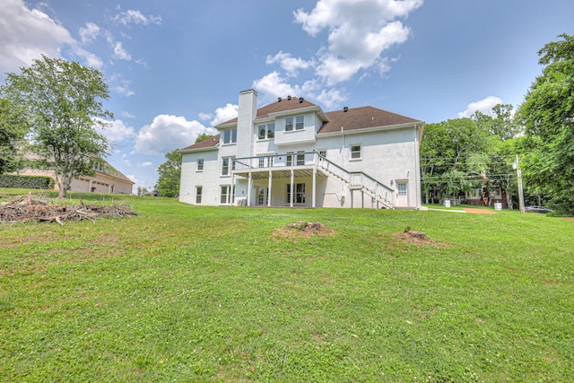 1202 Willow Brook Pass, Mount Juliet, TN 37122 - back of house featuring stairway, a chimney, a wooden deck, and a yard