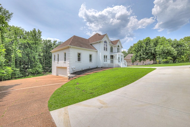 1202 Willow Brook Pass, Mount Juliet, TN 37122 - view of front of house with an attached garage, driveway, a front yard, and a shingled roof
