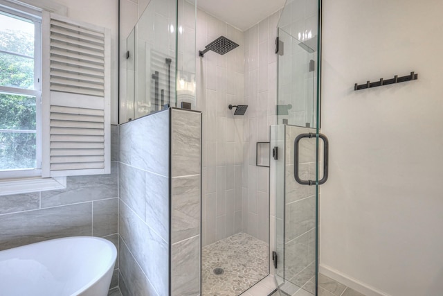 1202 Willow Brook Pass, Mount Juliet, TN 37122 - bathroom with a soaking tub, a shower stall, and plenty of natural light