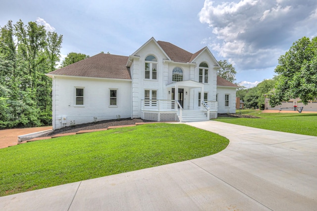 1202 Willow Brook Pass, Mount Juliet, TN 37122 - colonial inspired home with a shingled roof, a front lawn, and driveway