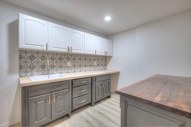 1202 Willow Brook Pass, Mount Juliet, TN 37122 - bar featuring light wood-style floors, tasteful backsplash, and recessed lighting