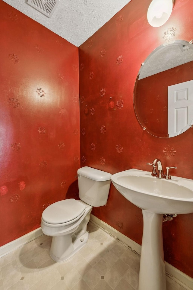 3524 Glenfalls Dr, Hermitage, TN 37076 - half bathroom featuring toilet and a textured ceiling