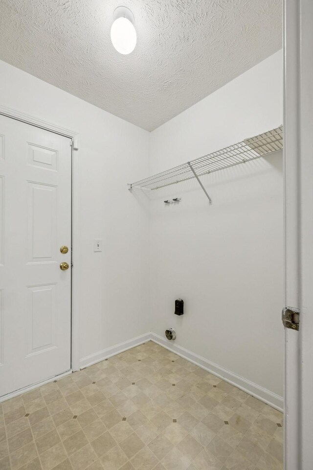 3524 Glenfalls Dr, Hermitage, TN 37076 - washroom with light floors and a textured ceiling