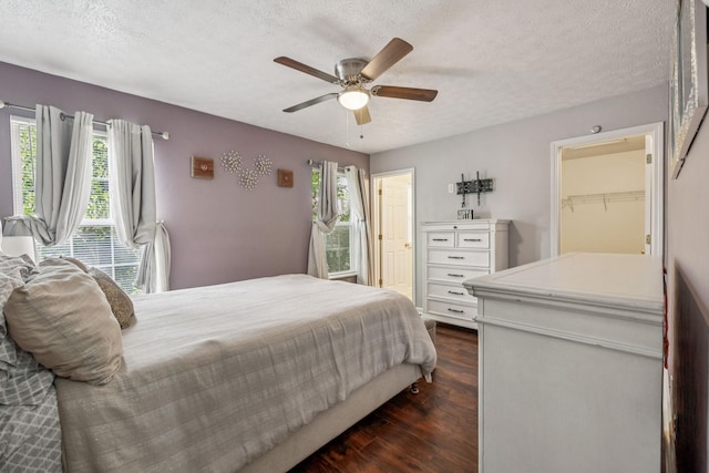 3524 Glenfalls Dr, Hermitage, TN 37076 - bedroom with dark wood-style floors, a textured ceiling, and a ceiling fan