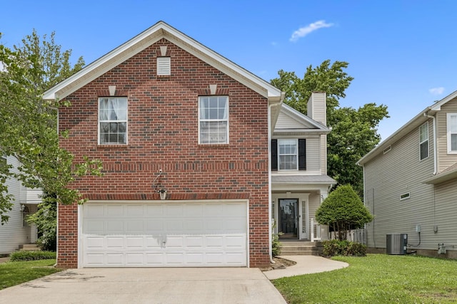 3524 Glenfalls Dr, Hermitage, TN 37076 - traditional home with brick siding, driveway, an attached garage, a front yard, and a chimney