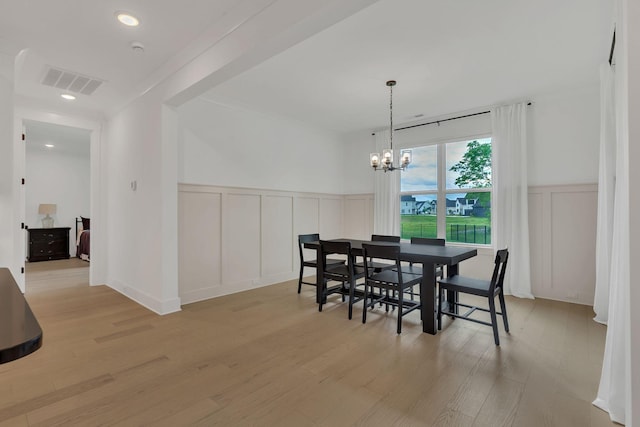 5509 Bridgemore Blvd, Murfreesboro, TN 37129 - dining area with a decorative wall, light wood-style floors, wainscoting, a chandelier, and recessed lighting