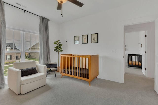 5509 Bridgemore Blvd, Murfreesboro, TN 37129 - bedroom featuring carpet, a crib, and ceiling fan