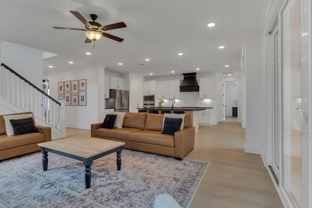 5509 Bridgemore Blvd, Murfreesboro, TN 37129 - living room featuring stairs, recessed lighting, light wood-type flooring, and ceiling fan