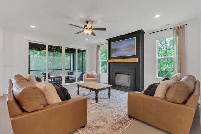 5509 Bridgemore Blvd, Murfreesboro, TN 37129 - living area featuring a ceiling fan, a large fireplace, recessed lighting, and wood finished floors