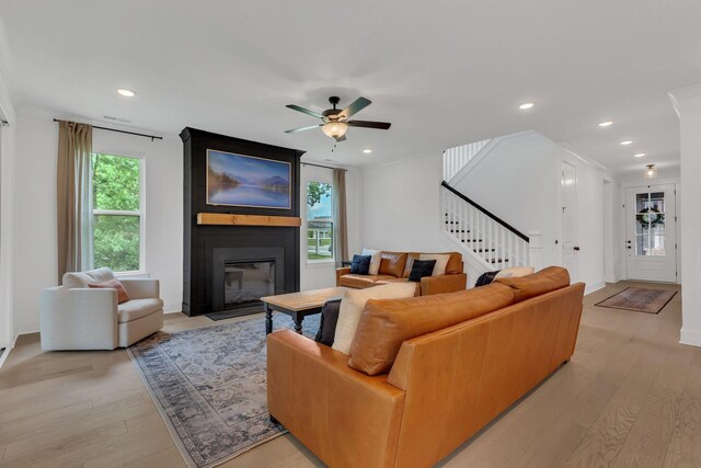5509 Bridgemore Blvd, Murfreesboro, TN 37129 - living room with stairway, light wood finished floors, recessed lighting, a fireplace, and ceiling fan