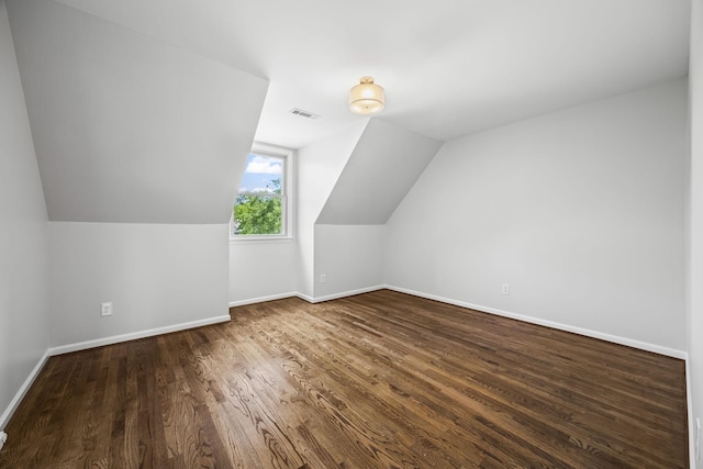 1183 Buckingham Cir, Franklin, TN 37064 - additional living space featuring wood finished floors and vaulted ceiling