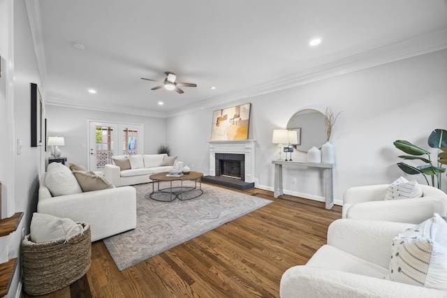 1183 Buckingham Cir, Franklin, TN 37064 - living area featuring wood finished floors, a ceiling fan, recessed lighting, crown molding, and a brick fireplace