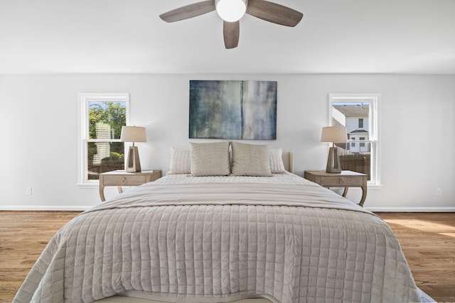 1183 Buckingham Cir, Franklin, TN 37064 - bedroom featuring wood finished floors and a ceiling fan