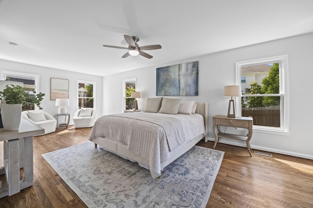 1183 Buckingham Cir, Franklin, TN 37064 - bedroom featuring wood finished floors and a ceiling fan