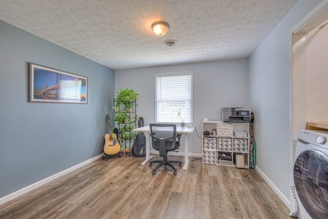 9649 Coles Ferry Pike, Lebanon, TN 37087 - office with washer / clothes dryer, wood finished floors, and a textured ceiling