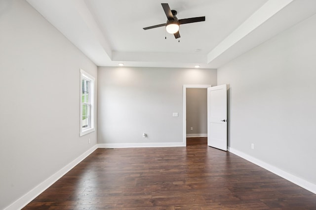 630 Bridle Path Ln, Hartsville, TN 37074 - spare room featuring a tray ceiling, a ceiling fan, dark wood-style floors, and recessed lighting