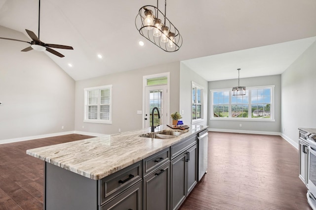630 Bridle Path Ln, Hartsville, TN 37074 - kitchen with open floor plan, a chandelier, dark wood-type flooring, stainless steel dishwasher, and ceiling fan