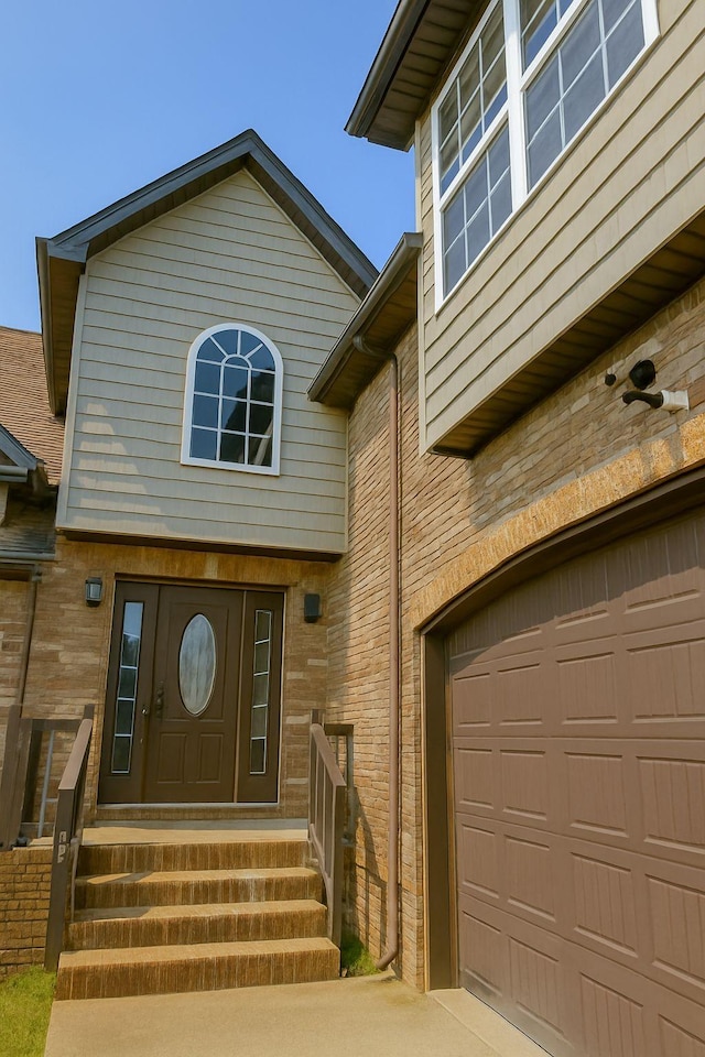 1590 Cobra Ln, Clarksville, TN 37042 - doorway to property featuring a garage and driveway