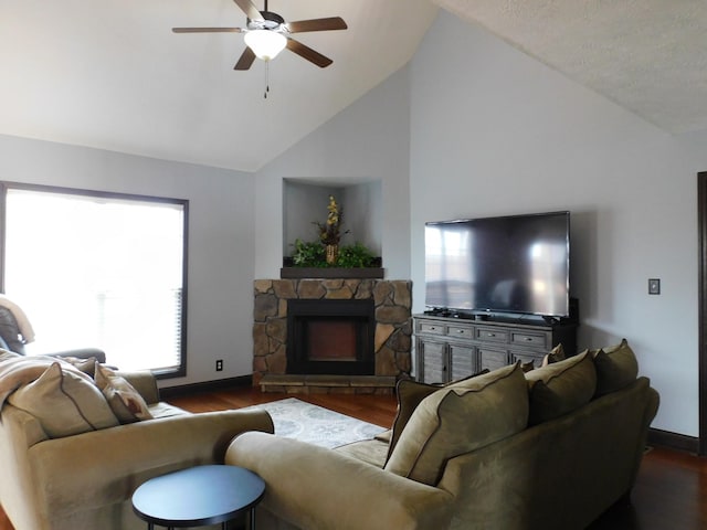 1590 Cobra Ln, Clarksville, TN 37042 - living area featuring a ceiling fan, wood finished floors, a fireplace, and high vaulted ceiling