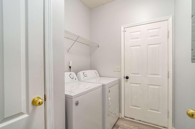 77 Kendall Park Dr, Nashville, TN 37217 - laundry area with independent washer and dryer and light wood-style floors